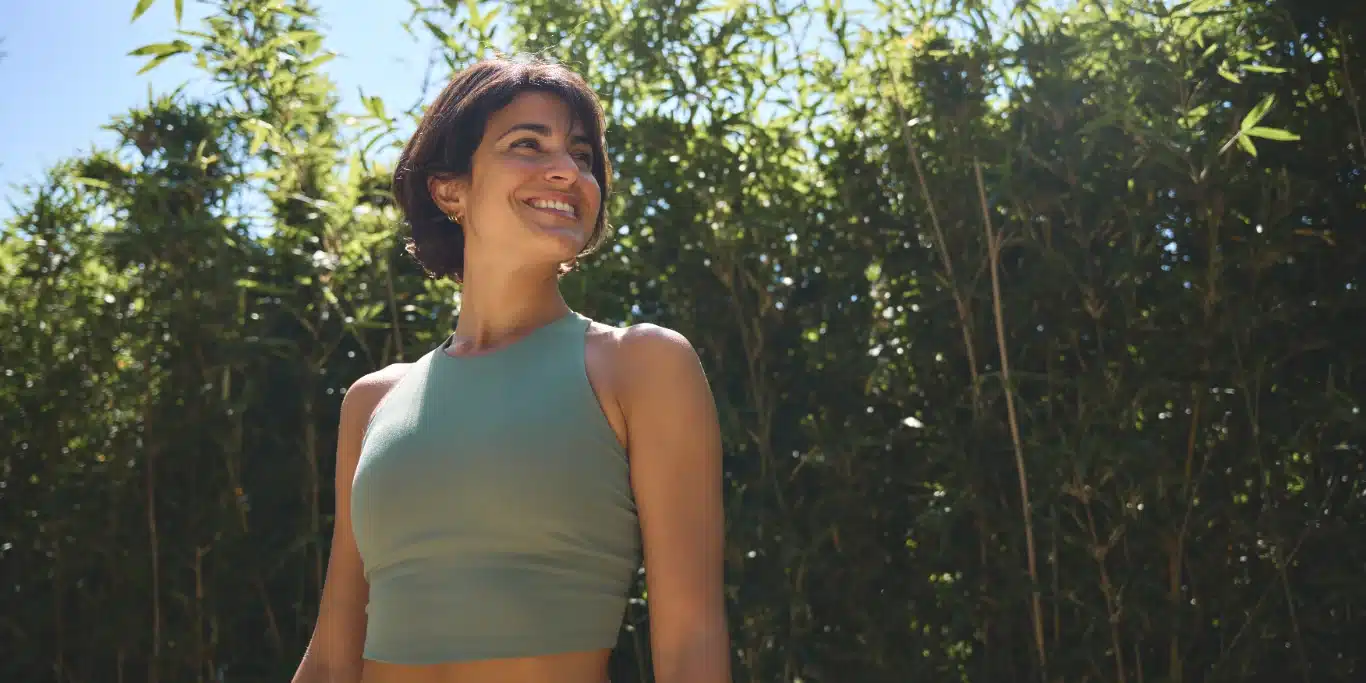 Hispanic woman wearing sportswear enjoying summer Hispanic woman wearing sportswear enjoying summer